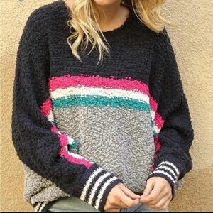 SALE:  THIS WEEKEND ONLY.A fun sweater oversized for today's society.